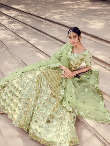 Pista Green Soft Net Heavy Embroidered Lehenga