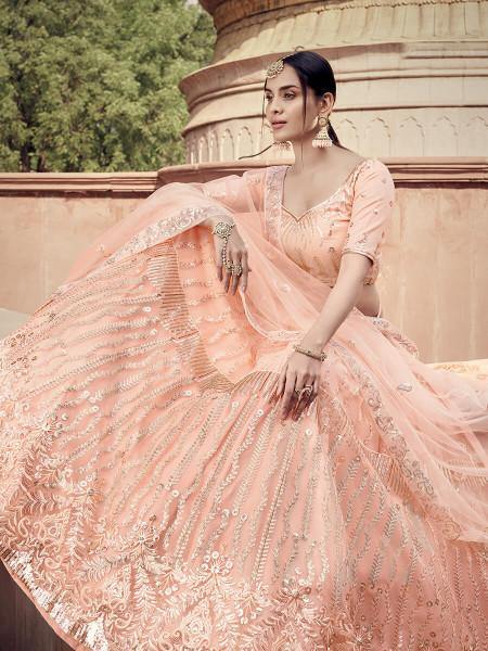 Peach Soft Net Heavy Embroidered Lehenga