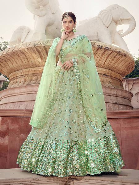 Pista Green Soft Net Heavy Embroidered Lehenga