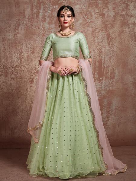 Pista Green Soft Net Heavy Embroidered Lehenga