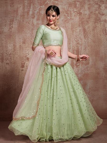 Pista Green Soft Net Heavy Embroidered Lehenga