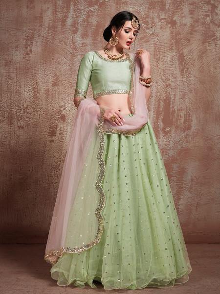 Pista Green Soft Net Heavy Embroidered Lehenga