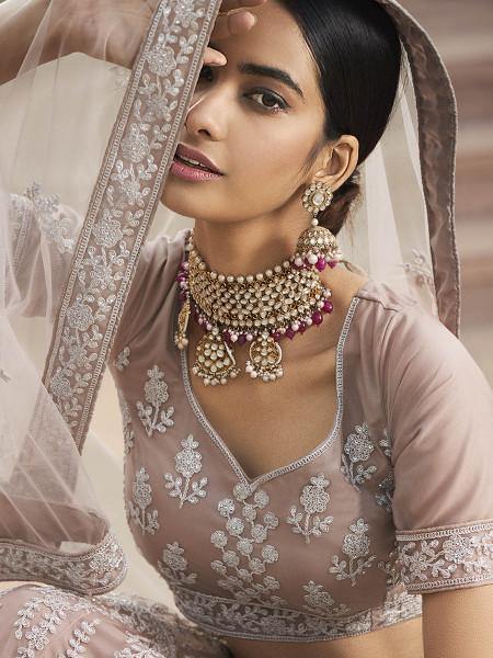 Mauve Heavy Embroidered Soft Net bridal Lehenga