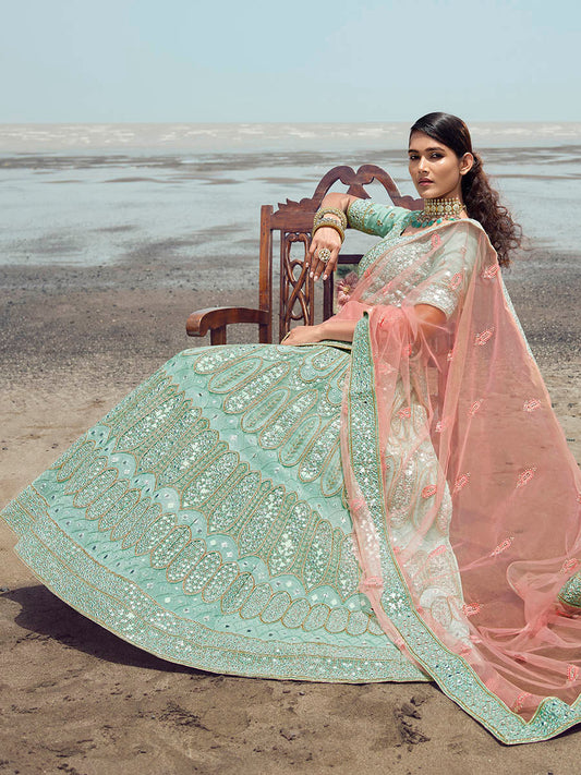 फ़िरोज़ी ऑर्गेंजा कढ़ाई वाला डिज़ाइनर लहंगा चोली