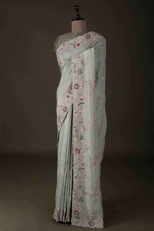 सुंदर फंक्शन वियर चिनॉन सिल्क हैवी एम्ब्रॉयडरी वर्क वाली साड़ी