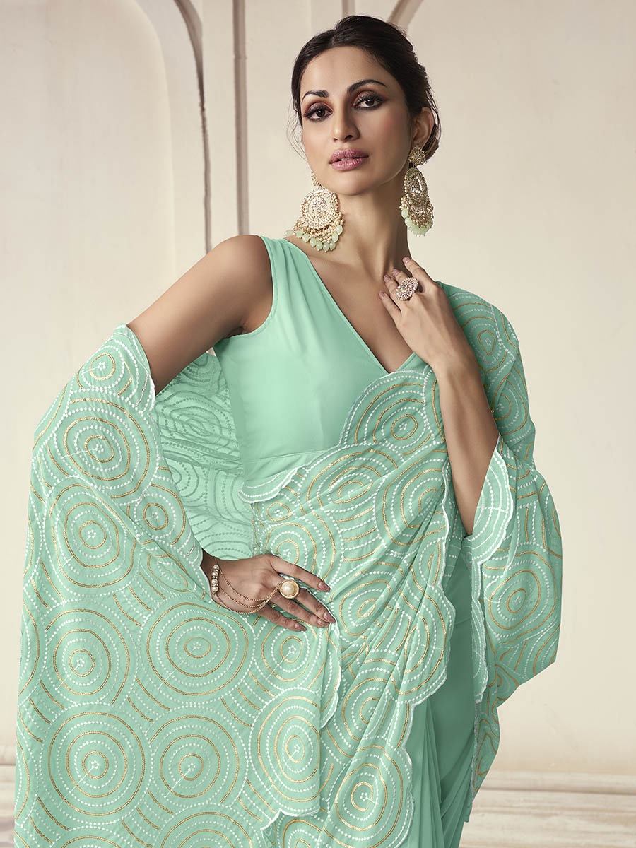 Blue georgette saree features gorgette blouse