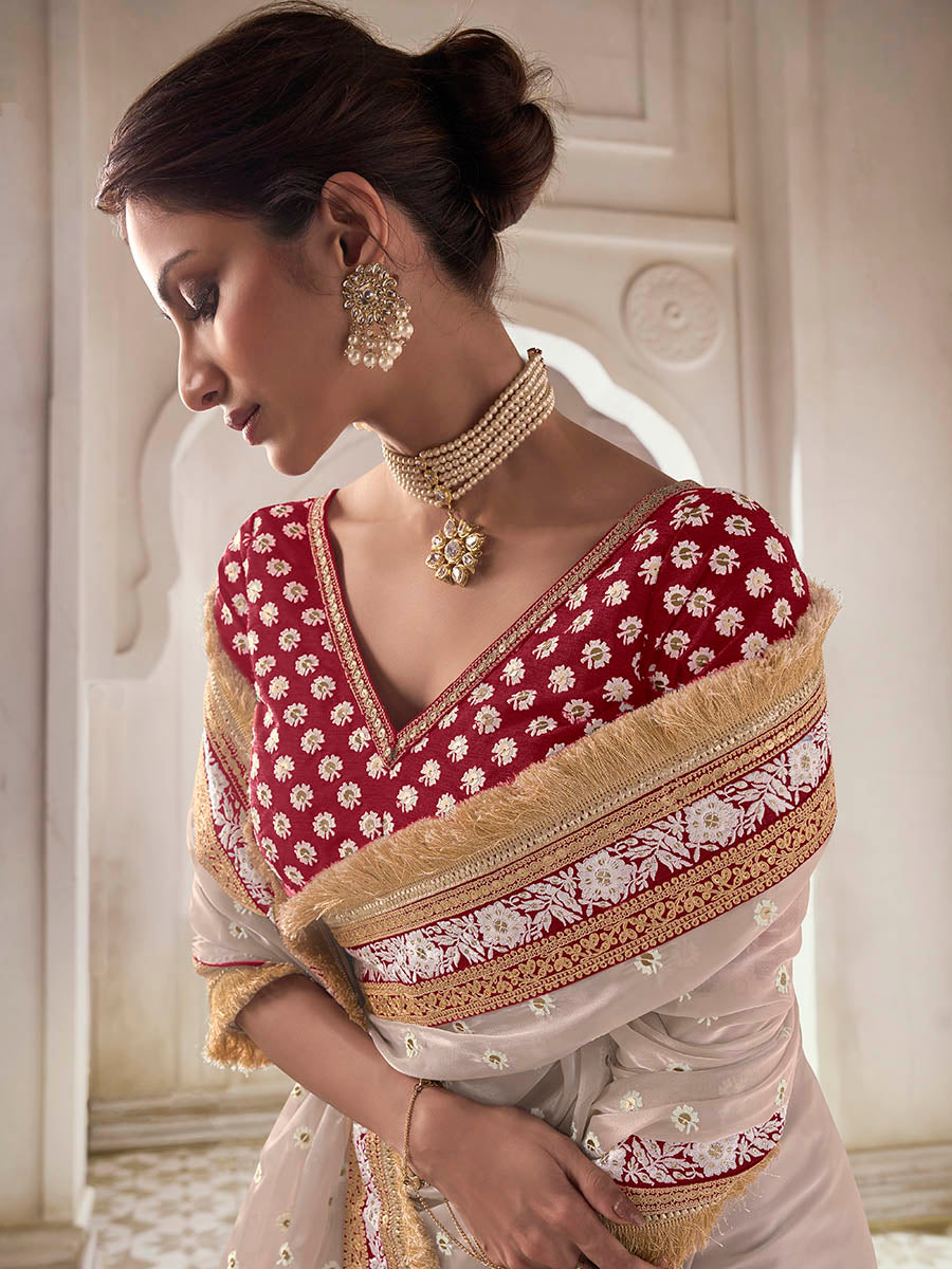 Beige organza saree features art silk blouse