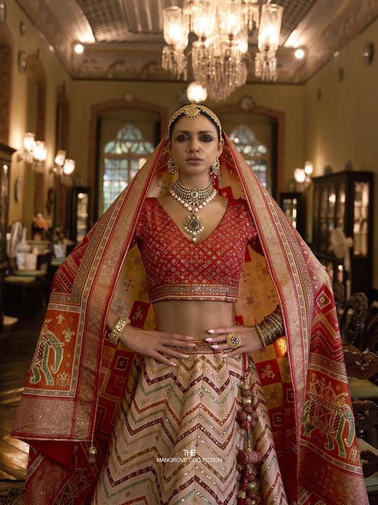 मल्टीकलर रजवाड़ी सिल्क मिरर वर्क ब्राइडल डिज़ाइनर लहंगा