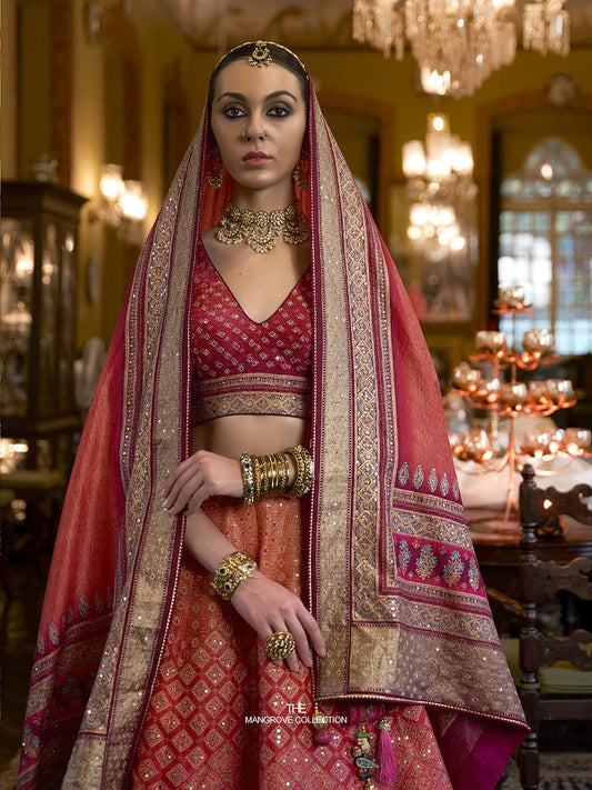 मल्टीकलर रजवाड़ी सिल्क मिरर वर्क ब्राइडल डिज़ाइनर लहंगा