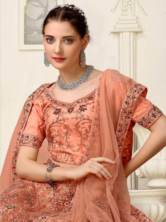 पीच नेट हैवी एम्ब्रॉयडरी लहंगा चोली