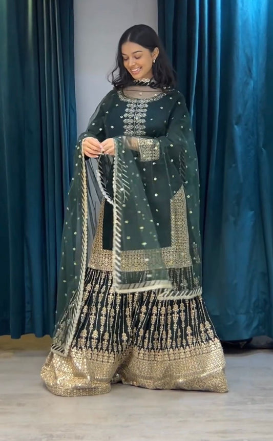 सीक्वेंस वर्क डार्क ग्रीन कलर का शरारा सूट