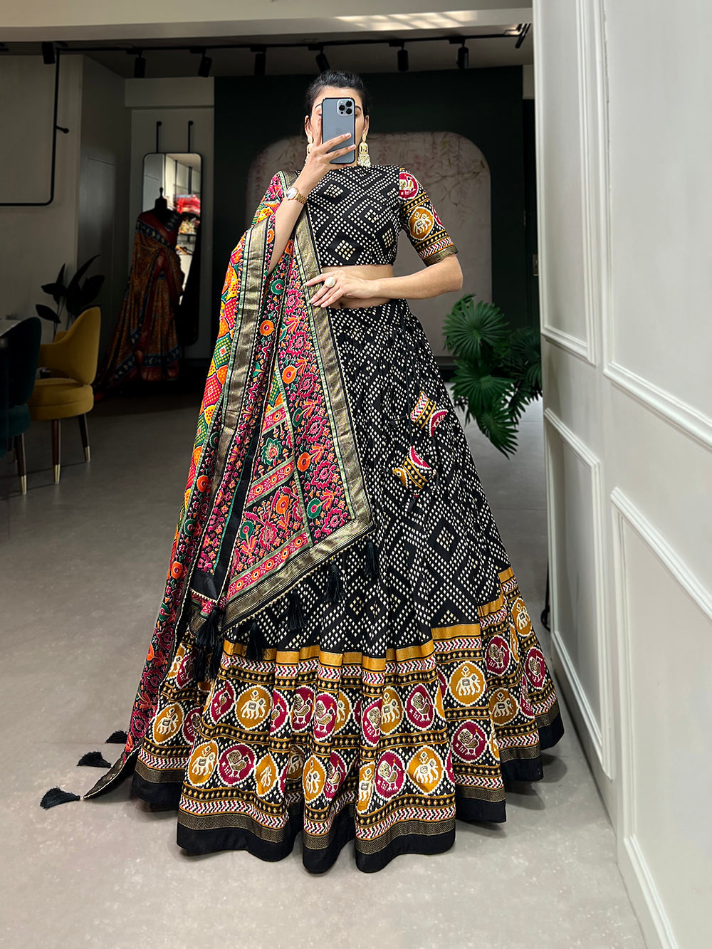 Black Color Bandhej And Patola Print With Foil Work Tussar Silk Lehnga Choli