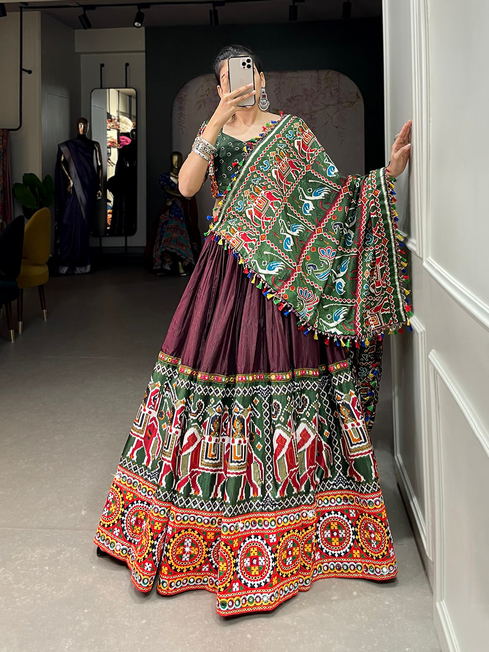 Brown Color Patola Print With Gamthi Work And Mirror Work Dola Silk Chaniya Choli