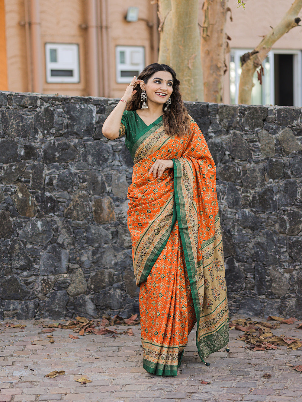 Orange Color Foil Printed And Stone Work Dola Silk Saree